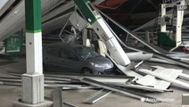 High winds bring gas station canopy down