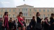 Feminist groups perform protest song outside Greek parliament