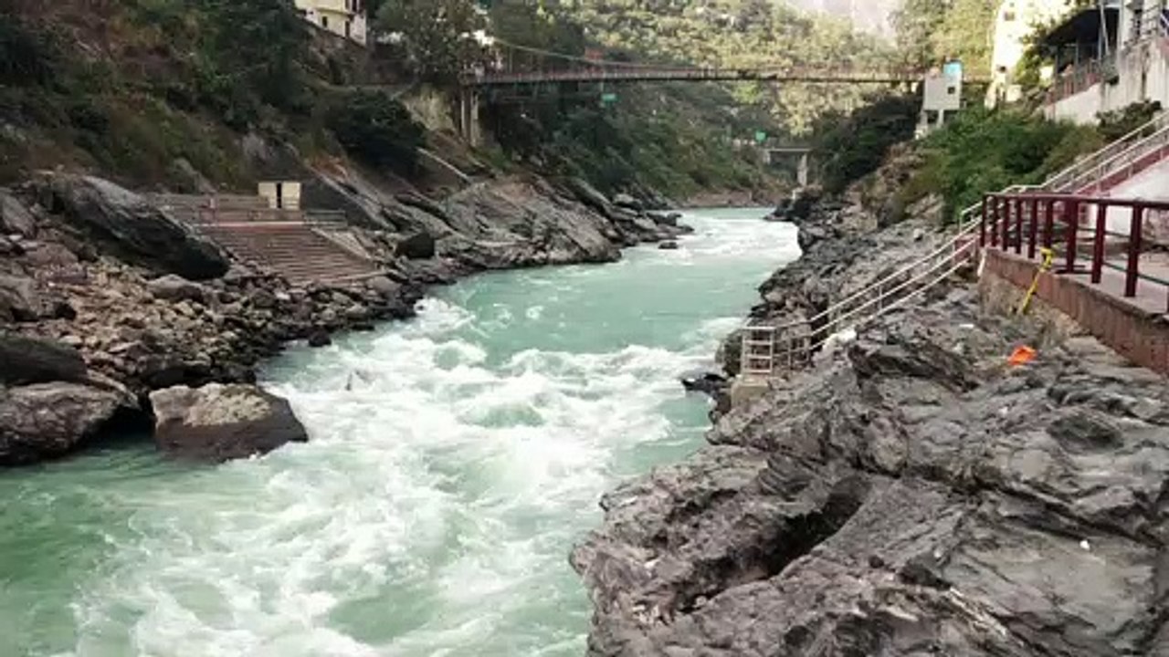 DEVPRAYAG SANGAM OF RIVER ALAKNANDA AND BHAGIRATHI WHICH MEETS TO BECOME THE HOLY RIVER GANGES.