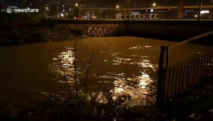 River Roding in UK bursts banks after downpour