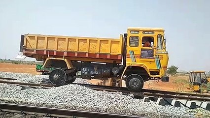 Truck Running on the railway track with Heavy Loads