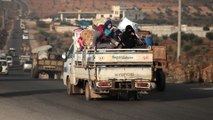 Tens of thousands flee rebel-held northwest Syria amid fierce airstrikes by government forces