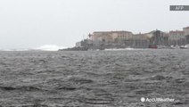 Violent winds causing an angry looking sea along coastline