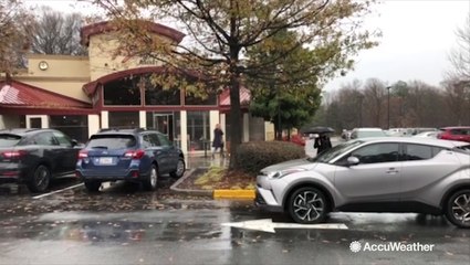Last-minute shoppers brave the rain