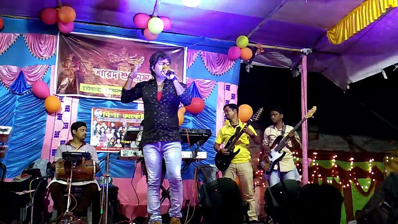 Du Haat Tule Bolre Krishno Naam
