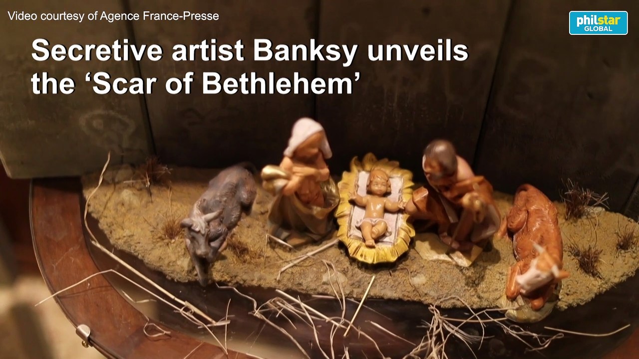 Mysterious artist Banksy unveils dark nativity in Bethlehem