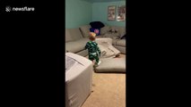 I'm okay! Hilarious moment toddler in Georgia tumbles to the floor with a cushion