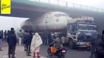 Indiapost Plane gets stuck under flyover while being towed