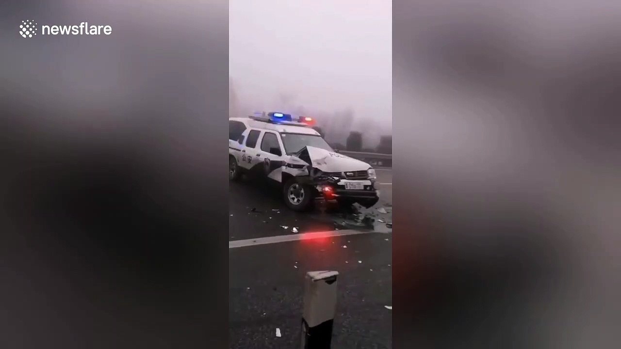 Dozens of cars left mangled in pileup on highway in northern China