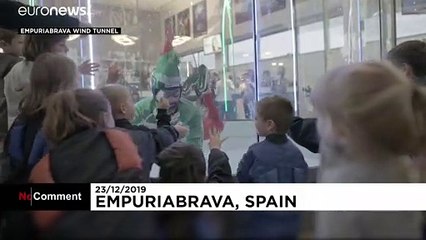 Watch: Indoor sky-diving elf draws Christmas lottery numbers in windtunnel