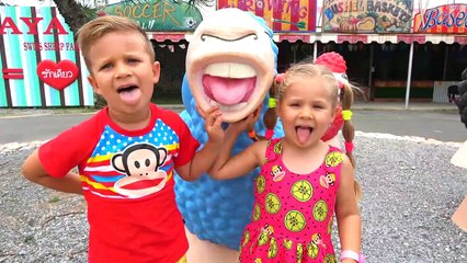 Diana and Roma pretend play hide and seek with Dad at farm sheep