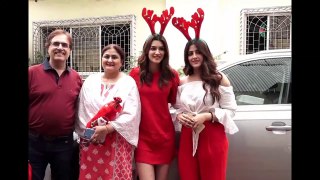 Kriti Sanon and her family celebrating Christmas with NGO Kids