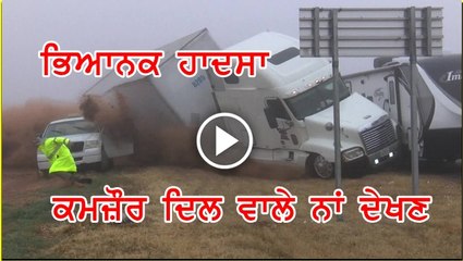 Truck filmed losing control on foggy road and crashing into accident scene