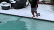 Woman Dances And Excitingly Jumps in Frozen Pool While it Snows Outside