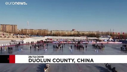 Some 600 athletes participate in ice dragon boat race