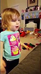 Genevieve singing "If You're Happy and You Know It-"