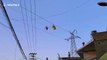 Chinese paraglider rescued after parachute becomes tangled on high-voltage power lines
