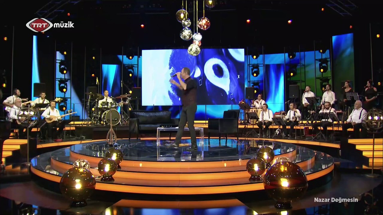 Sümer Ezgü: Sümer Ezgü | Dam Başında Sarı Çiçek