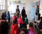 Suriyeli çocuklar okullarına geri dönmenin sevincini yaşıyor