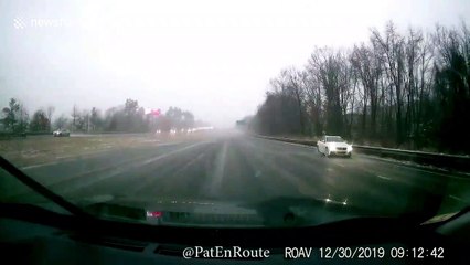 Car spins out of control on an icy road in Boston