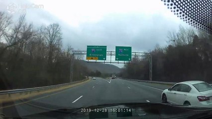 Two Trucks Block Both Lanes