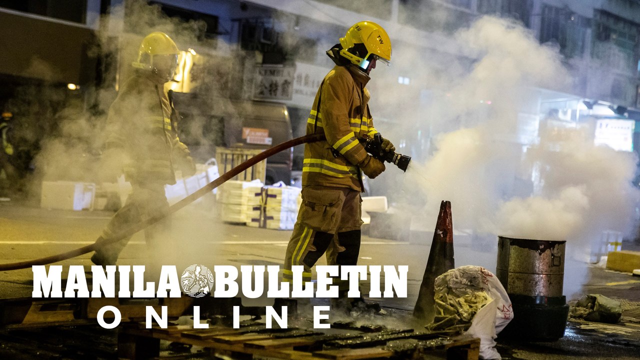 Police fire tear gas as Hong Kong rings in New Year