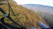 Aerial daredevil parachutes just inches above treetops speed-flying down French mountain
