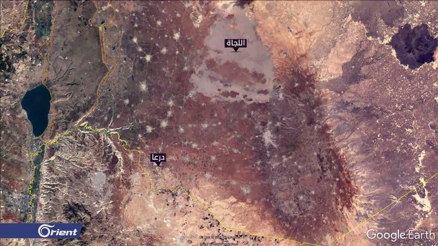 شبان يحرقون صور بشار ومبنى بلدية قرية مسيكة في اللجاة بدرعا