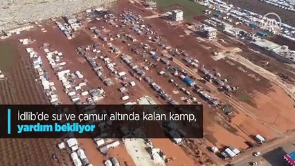 Çamur ve su altında kalan İdlib'liler yardım bekliyor