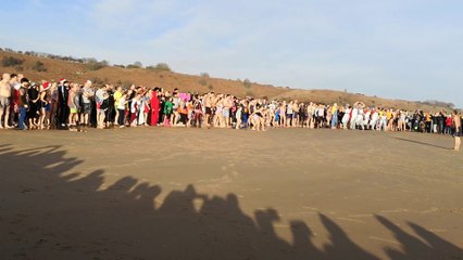 Watch as hundreds take the plunge for Alnmouth New Year dip
