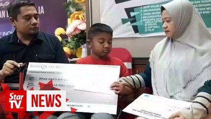 Boy suffering from myokymia after Sungai Kim Kim pollution receives RM 17,000 donation