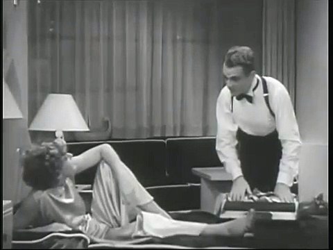 James Cagney shows Mae Clarke the door