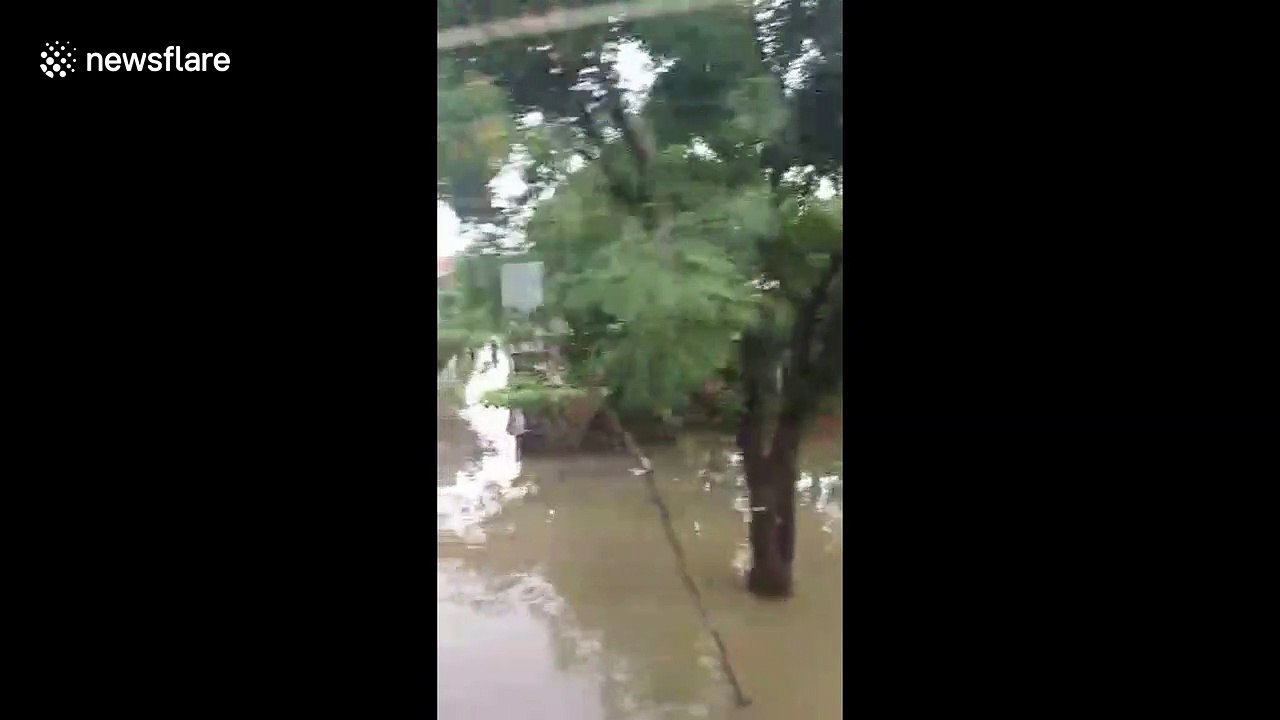 Tangerang's streets in Indonesia submerged with floodwaters as death toll reaches 43