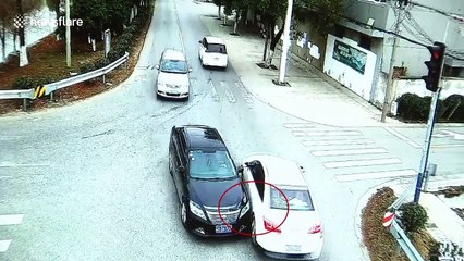 Car sent plunging into river after collision with another vehicle in China