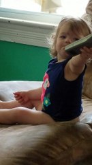 Little Girl "Talks" To Uncle Using Remote Control