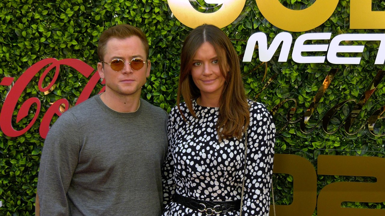 Taron Egerton and Emily Thomas 7th Annual "Gold Meets Golden" Red Carpet Fashion