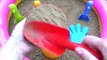 Toy shovels and sand molds _ Hand and colored balls _ Play on outdoor playground pool with sand