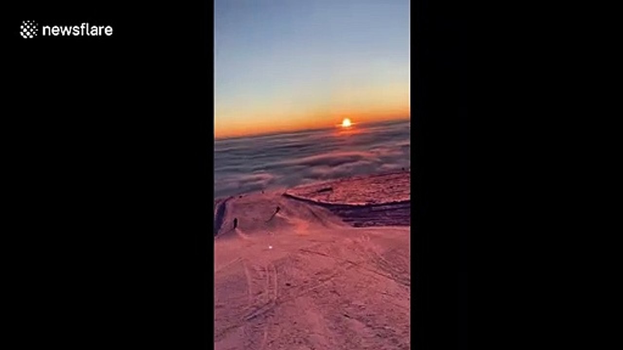 'Snowboarding above the clouds': Norwegian films his descent down mountain with stunning picturesque backdrop