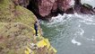 This is the terrifying moment a daredevil backflipped off a massive 66ft cliff