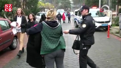 Balkondan düşen genç kızı battaniye ve çarşaf gererek yakalamaya çalıştılar