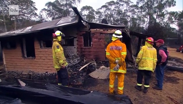 Emotional moment couple returns to home damaged in fires