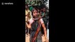 Woman in Indian village saves snake from being killed then dances with it