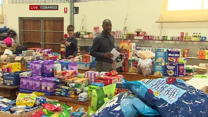 Residents of Cobargo, New South Wales, deal with the aftermath of the wild fires - BBC News