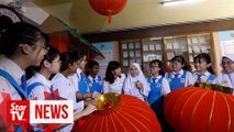 Ministry to look into teachers’ complaints over CNY decor, says Teo