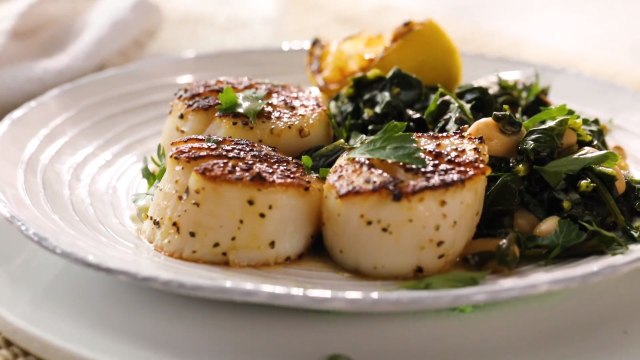 How to Make Seared Scallops with White Bean Ragu & Charred Lemon