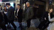 Stephen Fry tries to sneak past photogs at Magic Gone Wrong in London