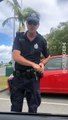 Perturbed Police Man Doesn't Like Driver's Phone