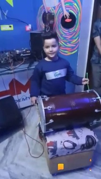 Drum  played by a boy.......