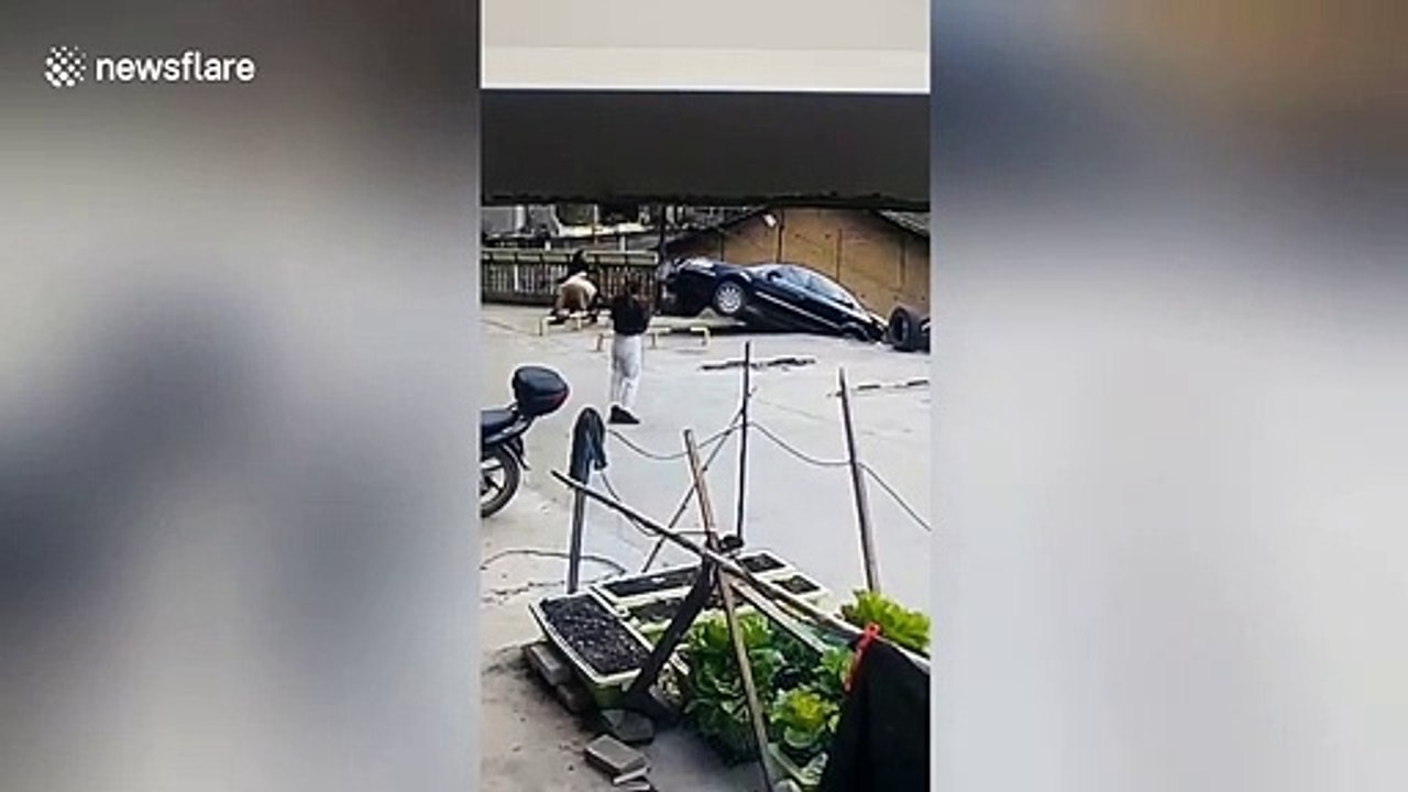 Car crashes off 23-foot slope after driver presses accelerator by mistake in China