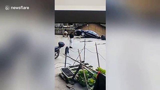 Car crashes off 23-foot slope after driver presses accelerator by mistake in China